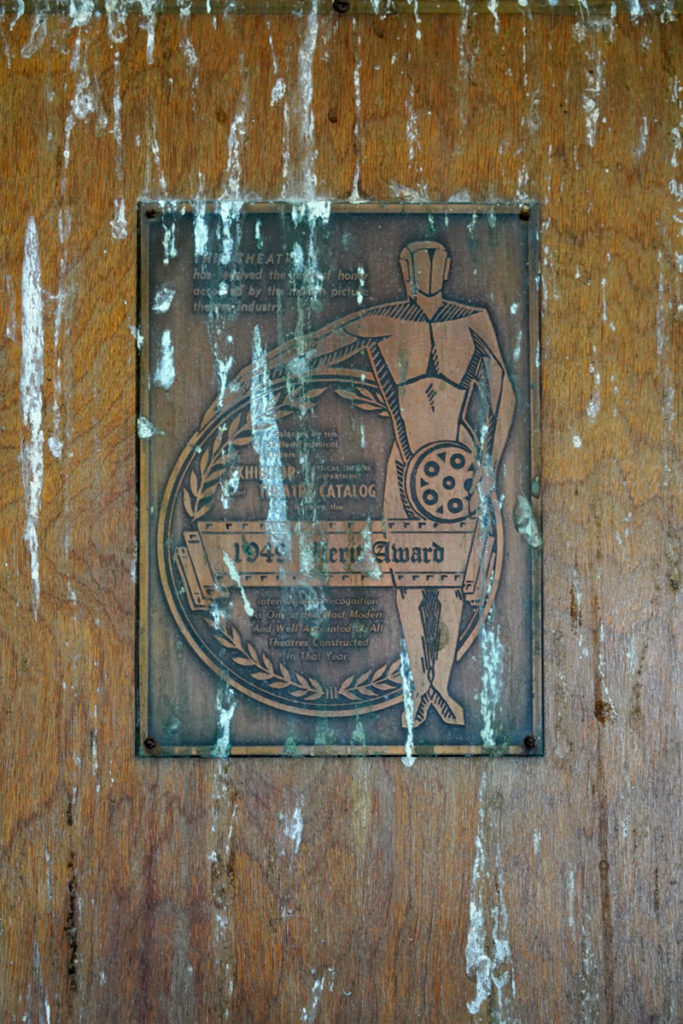 plaque on door in sheas theater