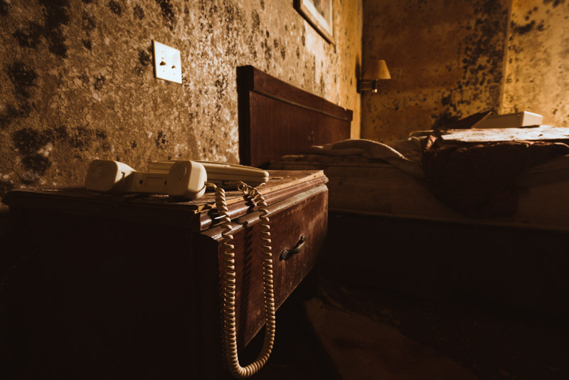 phone in abandoned hotel room