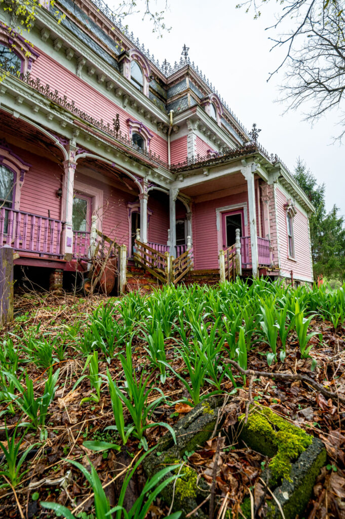 abandoned pink victorian home