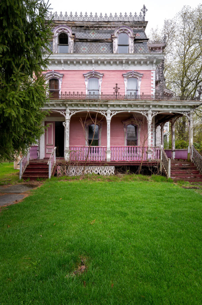 abandoned pink victorian home