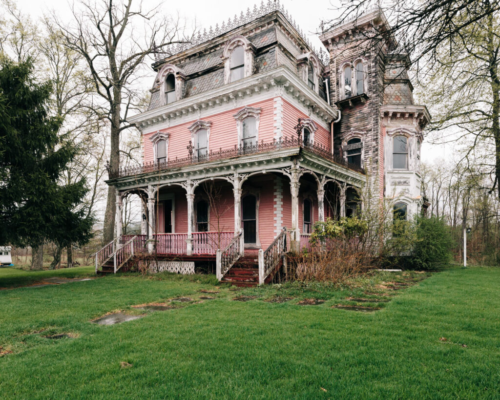 abandoned pink victorian home