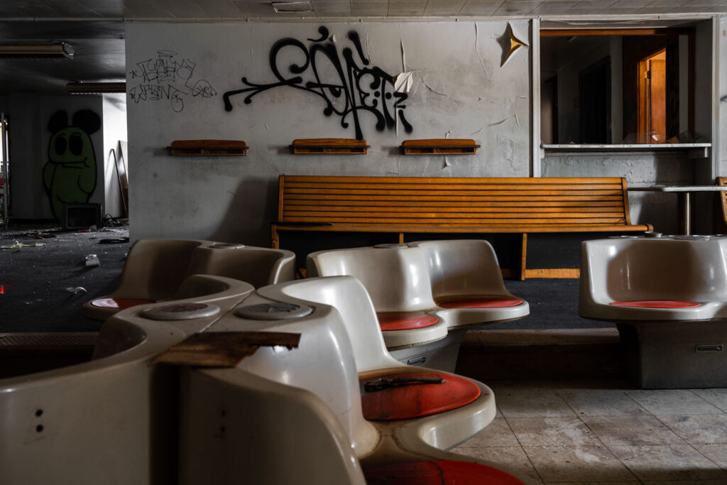 seats inside abandoned bowling alley
