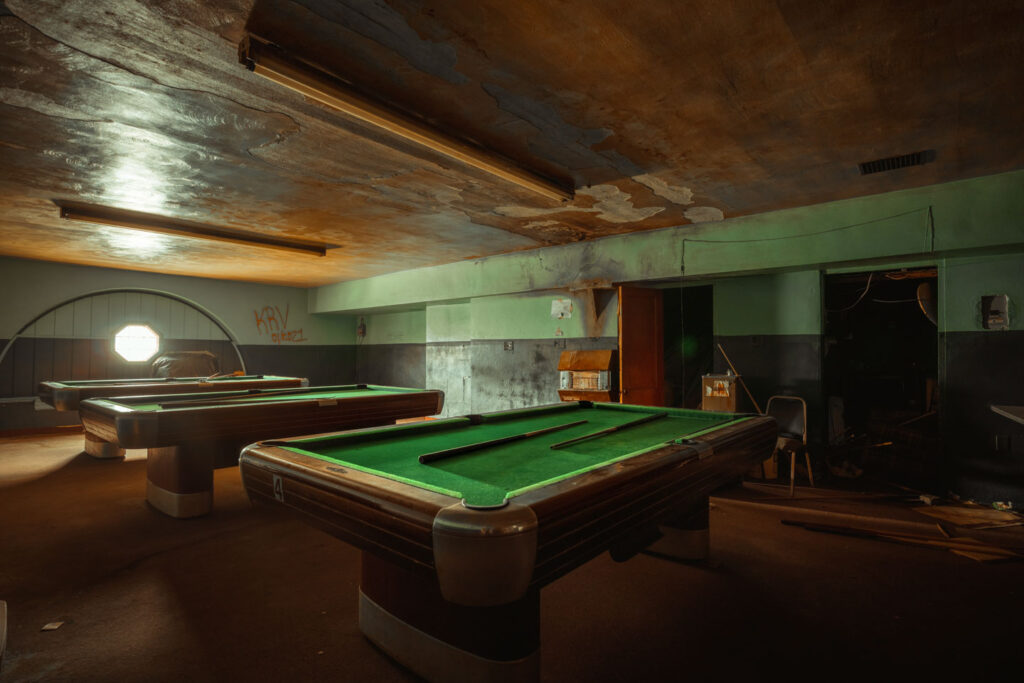 pool tables left behind in abandoned bowling alley