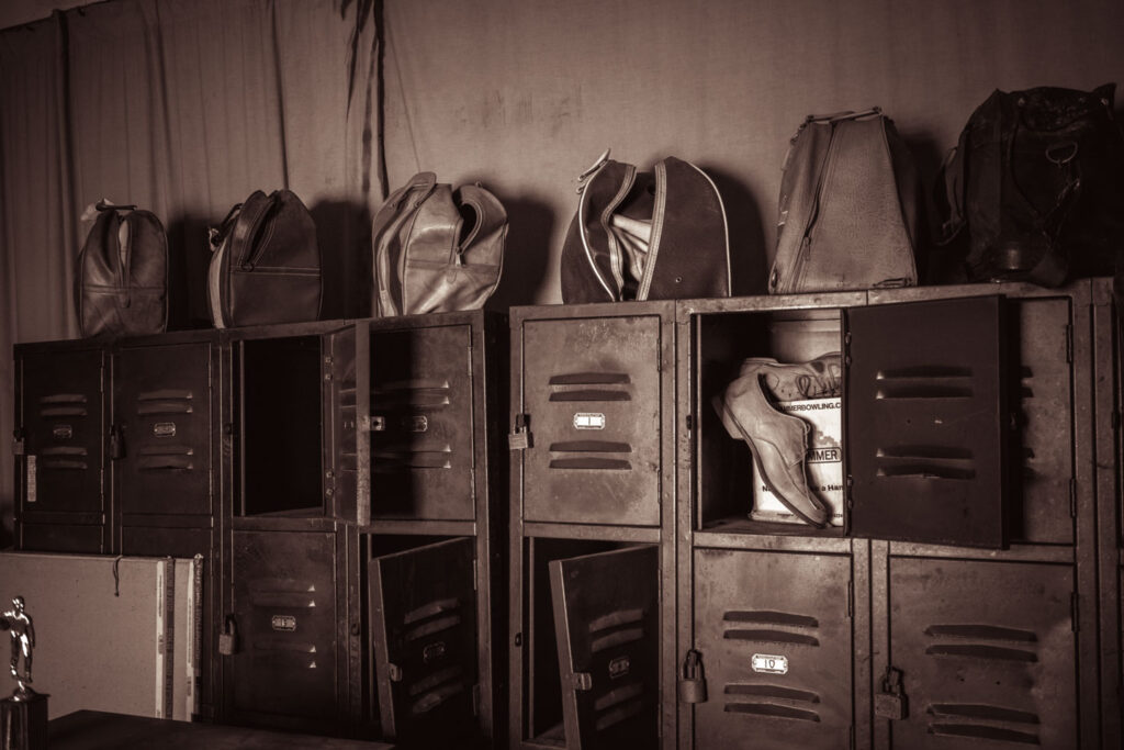 shows and bags left behind in abandoned bowling alley